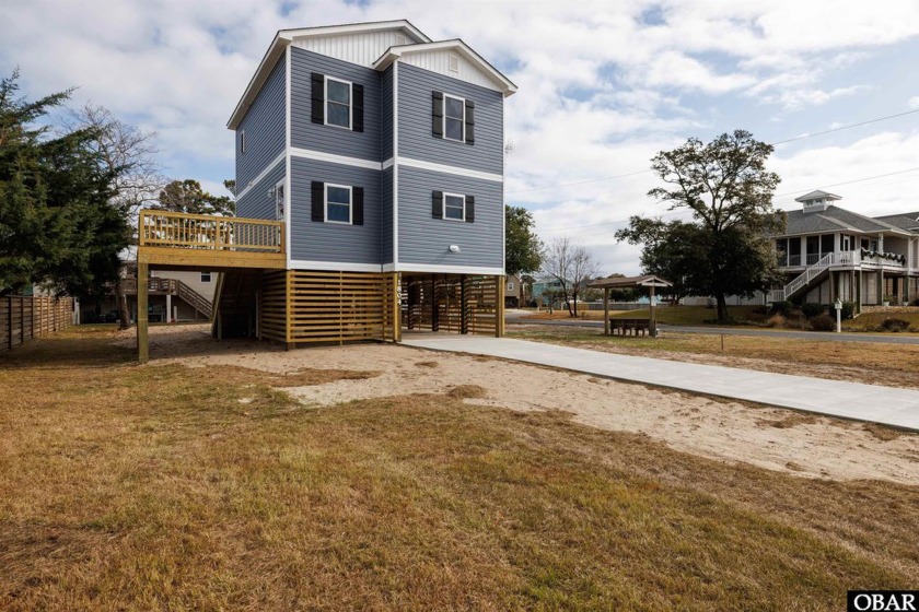 This brand new semi-soundfront home has stunning sound views and - Beach Home for sale in Kill Devil Hills, North Carolina on Beachhouse.com