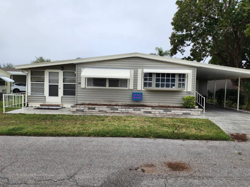 Welcome to this double wide mobile home located in Colony Cove - Beach Home for sale in Ellenton, Florida on Beachhouse.com