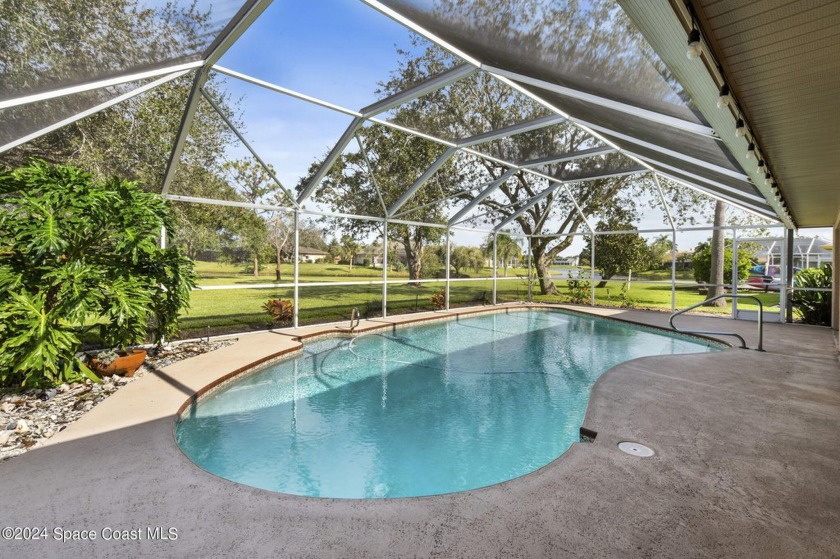 Nested amidst rare 0.96 acres on a serene lake, this 3-bed/ - Beach Home for sale in Melbourne, Florida on Beachhouse.com