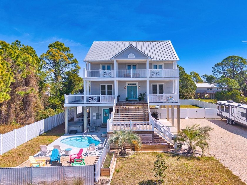 Check out this amazing Bay View home located on beautiful St - Beach Home for sale in St. George Island, Florida on Beachhouse.com