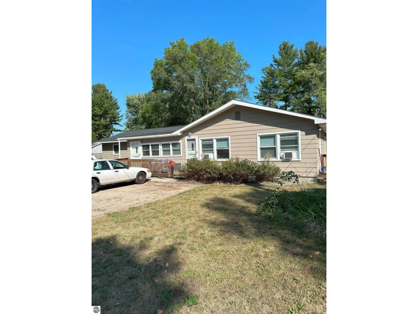 Great investment opportunity owning this duplex! Tenants are - Beach Lot for sale in Elk Rapids, Michigan on Beachhouse.com