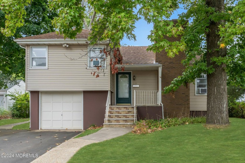 Welcome to this charming 4-bedroom, 2 full-bath split-level home - Beach Home for sale in Long Branch, New Jersey on Beachhouse.com