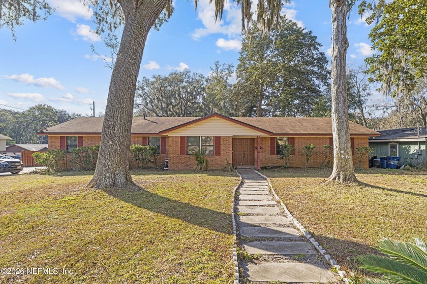 A beautiful ranch-style home with a classic red-brick exterior - Beach Home for sale in Jacksonville, Florida on Beachhouse.com