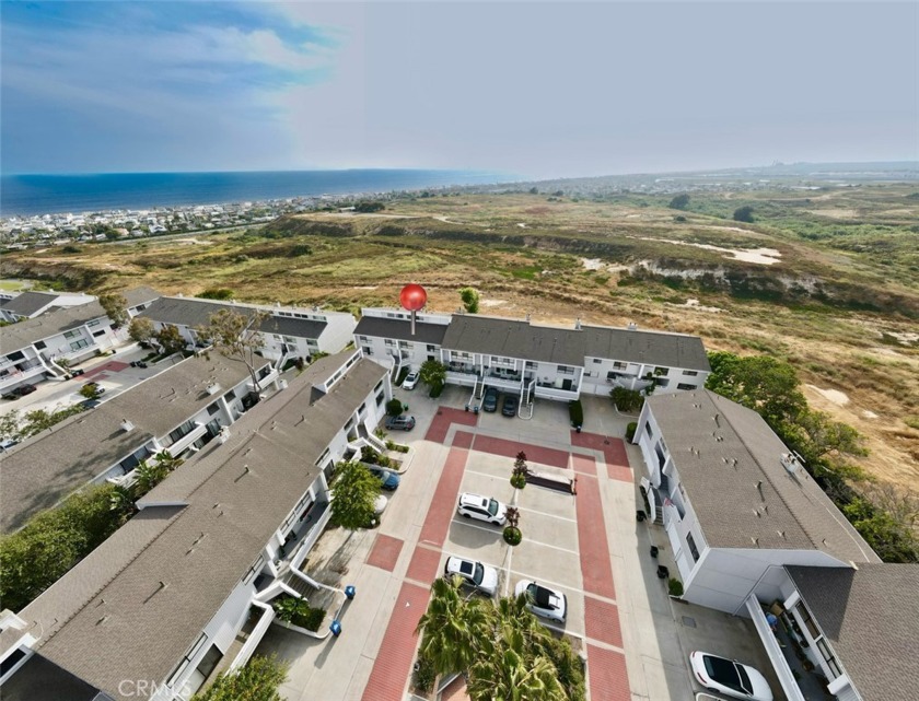 Welcome to 7 Summerwind Ct., one of the rare properties that - Beach Townhome/Townhouse for sale in Newport Beach, California on Beachhouse.com
