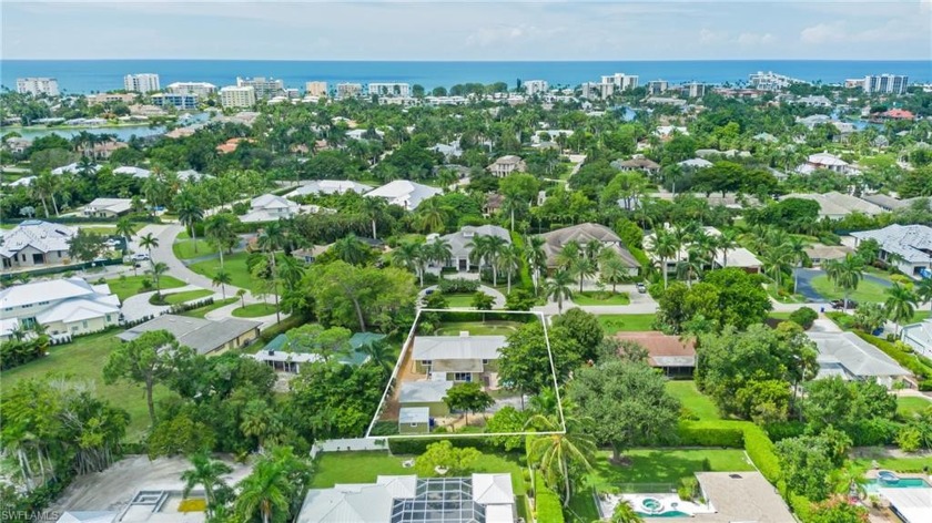 With an ideal Moorings location, less than one mile to the - Beach Home for sale in Naples, Florida on Beachhouse.com