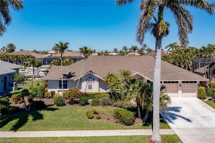 Tropical Boaters Paradise. New Dock, Lift, Pilings with Large - Beach Home for sale in Marco Island, Florida on Beachhouse.com