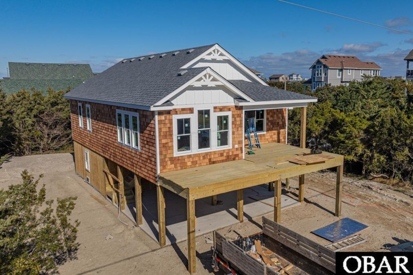 Nestled in the heart of Hatteras Colony, Salvo, this stunning - Beach Home for sale in Salvo, North Carolina on Beachhouse.com