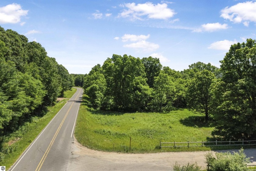 Your Up-North escape awaits on this gorgeous 10-acre corner - Beach Acreage for sale in Manistee, Michigan on Beachhouse.com