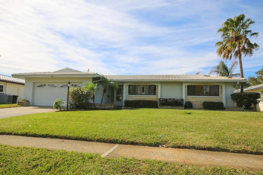 Spacious 3 Bedroom, 2 Bathroom, 2 Car Garage Pool Home in - Beach Home for sale in Clearwater, Florida on Beachhouse.com