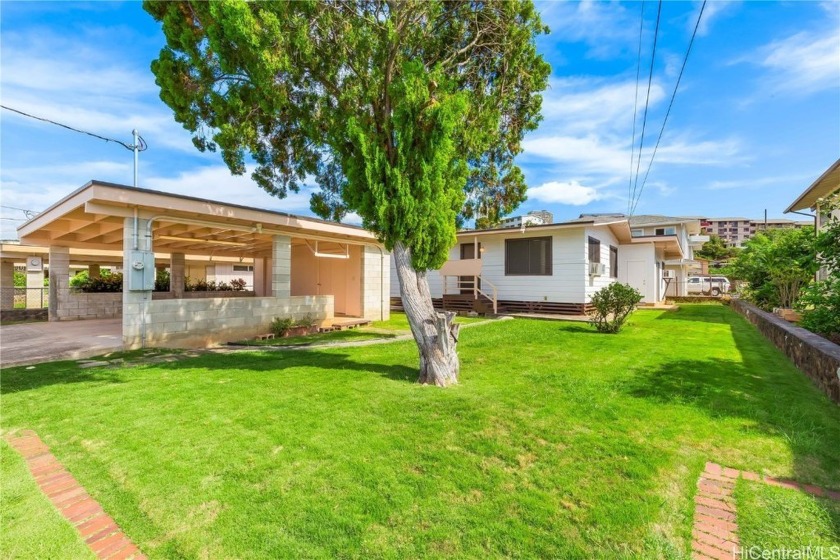 This charming spacious single-family home offers 3 bedrooms, 2 - Beach Home for sale in Aiea, Hawaii on Beachhouse.com