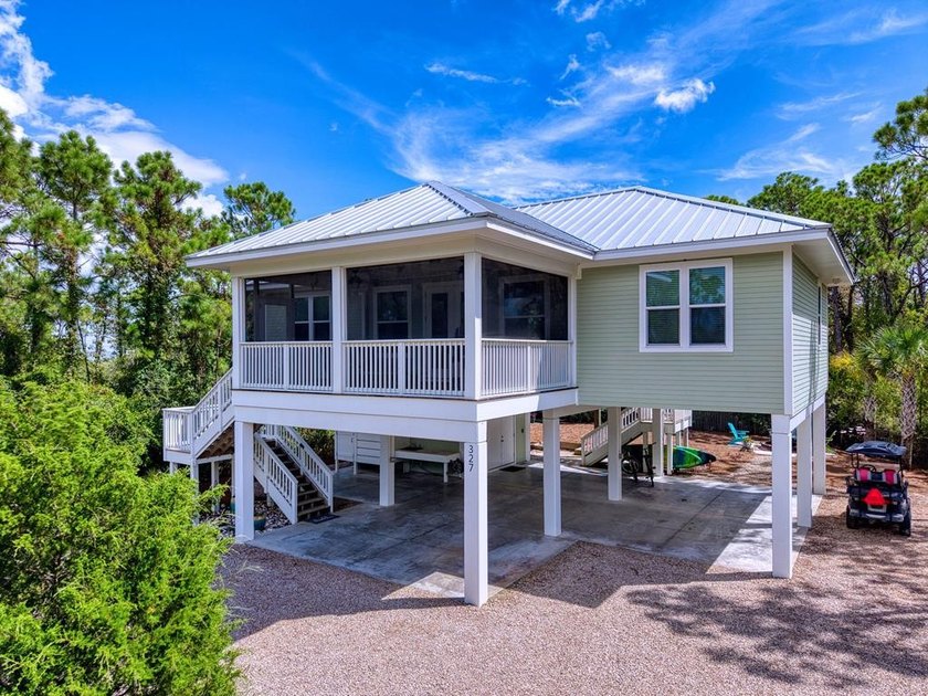 *Tropical Treehouse* is a beautiful bayside home that upon - Beach Home for sale in St. George Island, Florida on Beachhouse.com