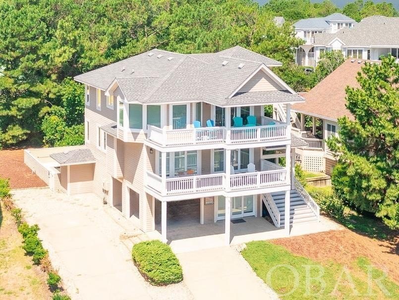 This beautifully maintained 6-bedroom, 5.5-bathroom home in - Beach Home for sale in Corolla, North Carolina on Beachhouse.com