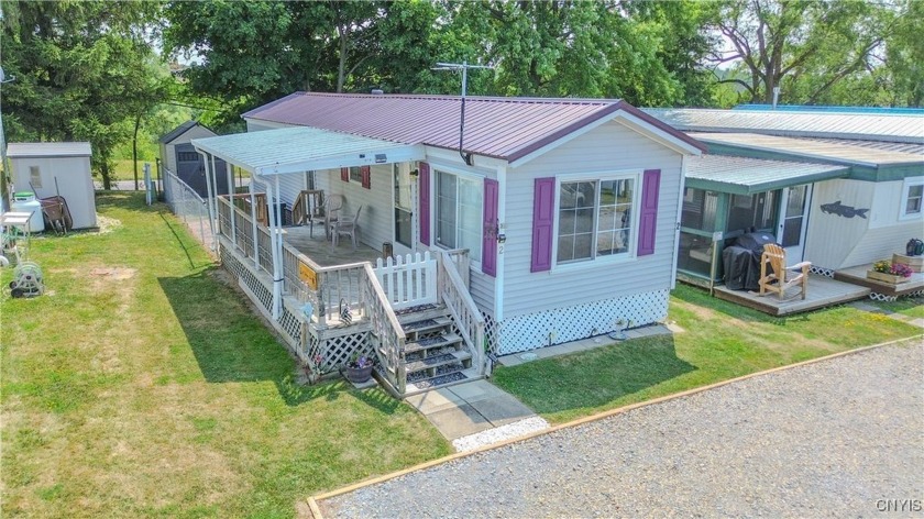 FULLY FURNISHED MOBILE HOME IN CLAYTON WITH DOCK AND RIVER - Beach Home for sale in Clayton, New York on Beachhouse.com