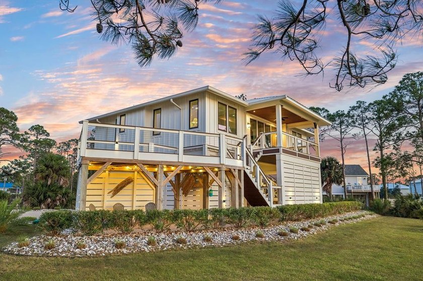 A home where the water always takes center stage. This 2022 - Beach Home for sale in St. George Island, Florida on Beachhouse.com