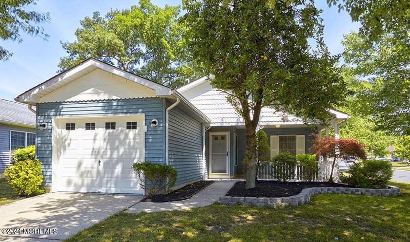 This charming renovated home, nestled on a corner lot and - Beach Home for sale in Toms River, New Jersey on Beachhouse.com