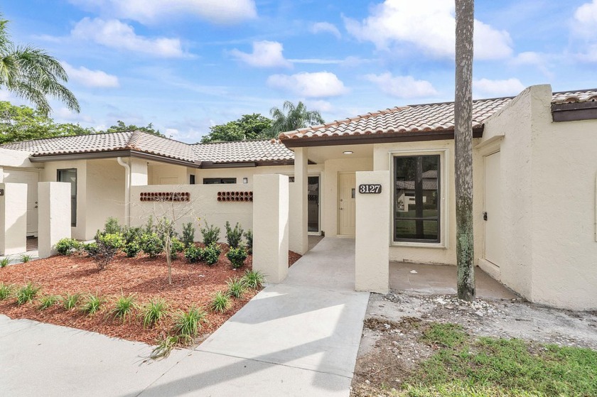 FULLY REMODELED VILLA IN EAST BOCA RATON'S GATED WINDWOOD - Beach Home for sale in Boca Raton, Florida on Beachhouse.com