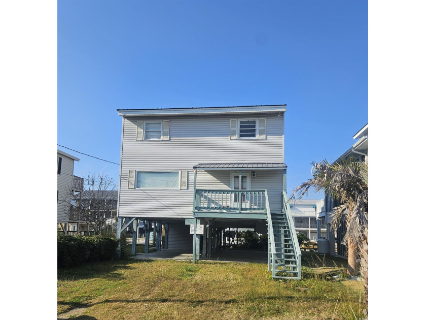 Don't miss this 3BR/2BA raised beach home tucked away on quiet - Beach Home for sale in North Myrtle Beach, South Carolina on Beachhouse.com