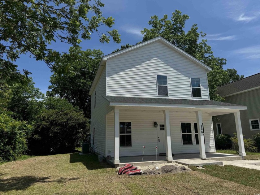 A whole lot of cuteness right here at 908 Merriman Road on The - Beach Home for sale in Georgetown, South Carolina on Beachhouse.com