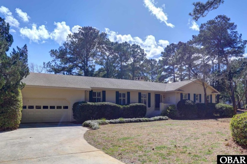 This Southern Shores Canal Front Beauty is a MUST SEE! Tucked - Beach Home for sale in Southern Shores, North Carolina on Beachhouse.com