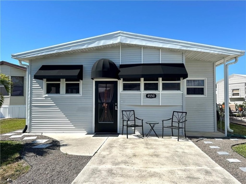Welcome to this charming 2 bedroom, 1 bath mobile home cottage - Beach Home for sale in Estero, Florida on Beachhouse.com