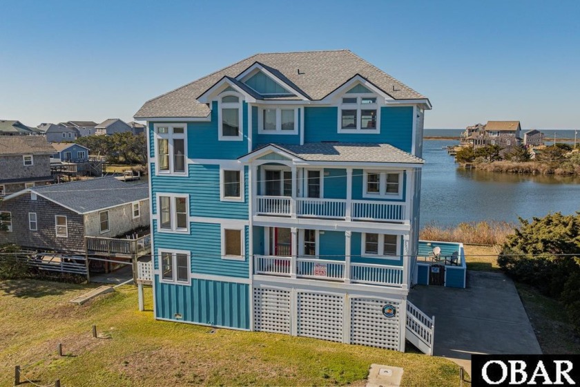 Welcome to Crystal Blue Persuasion, a stunning canal-front - Beach Home for sale in Avon, North Carolina on Beachhouse.com