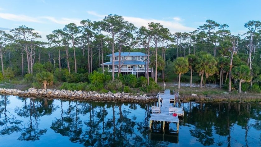 Welcome to a true bayfront retreat where Old Florida charm meets - Beach Home for sale in St. George Island, Florida on Beachhouse.com