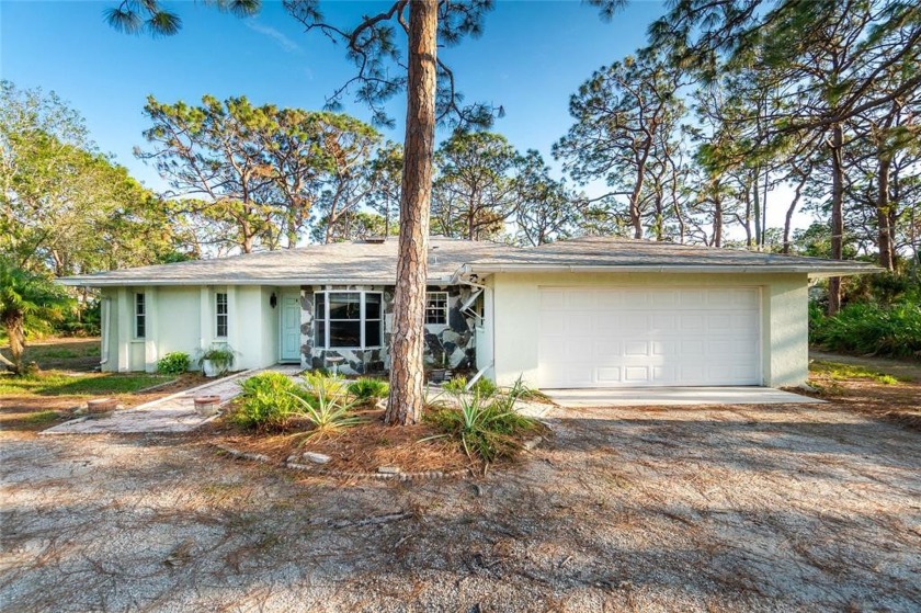Wow!! CALLING ALL CAR COLLECTORS!  DETACHED 9 CAR GARAGE!  Plus - Beach Home for sale in Englewood, Florida on Beachhouse.com