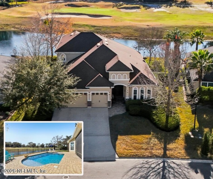 Stunning pool home with a pond to golf course view in gated - Beach Home for sale in Green Cove Springs, Florida on Beachhouse.com