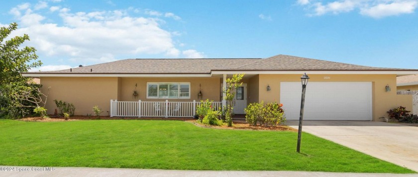 Remarkable, CANAL FRONT beauty offers NEW VINYL PLANK FLOORS in - Beach Home for sale in Satellite Beach, Florida on Beachhouse.com