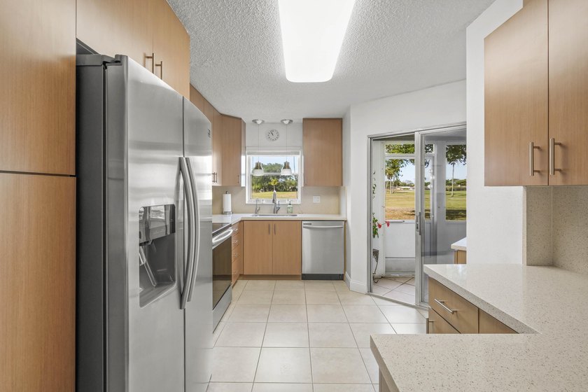 Light, bright, & timelessly renovated 2-bed, 2-bath, 1st-floor - Beach Condo for sale in Lake Worth, Florida on Beachhouse.com