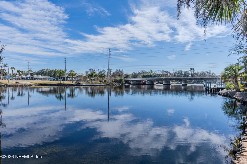 Enjoy peaceful riverfront living in this well maintained end - Beach Condo for sale in Jacksonville, Florida on Beachhouse.com