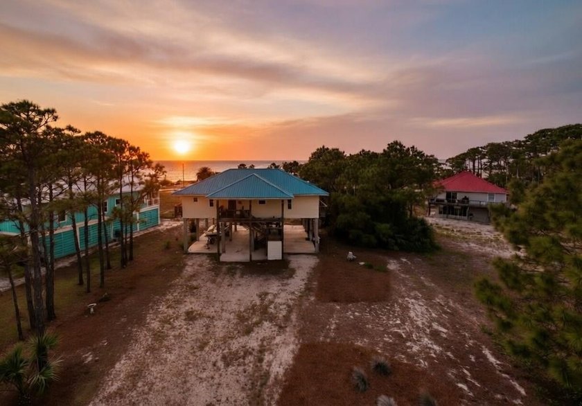Wake up to sweeping bay views in this beautifully designed 3 - Beach Home for sale in St. George Island, Florida on Beachhouse.com