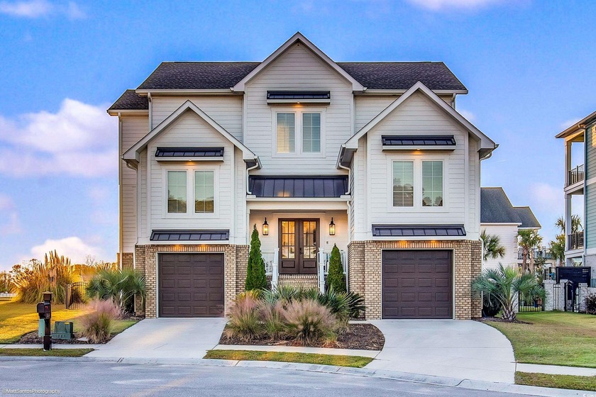 Experience luxury coastal living in this custom-designed 5 - Beach Home for sale in North Myrtle Beach, South Carolina on Beachhouse.com