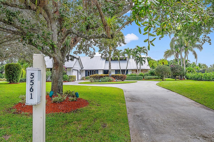 Here's your chance to own a home within the manned-gated - Beach Home for sale in Palm Beach Gardens, Florida on Beachhouse.com