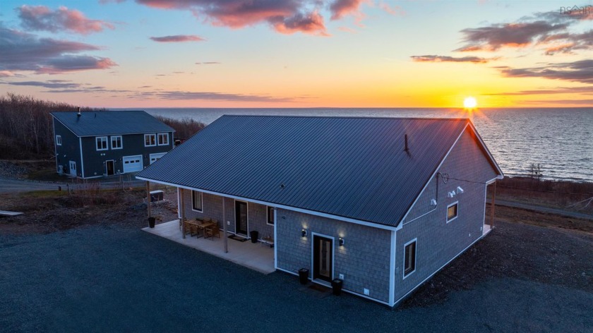 Experience unparalleled coastal living with this exceptional - Beach Home for sale in Georgeville,  on Beachhouse.com