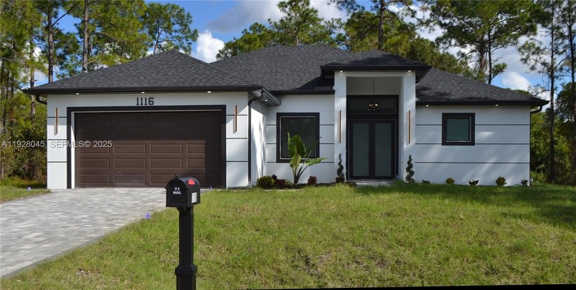 New construction! Beautiful 3-bedroom + den, 2-bath home on a - Beach Home for sale in Lehigh Acres, Florida on Beachhouse.com