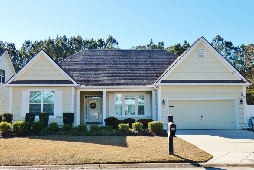 Sitting on a private, wooded lot in the highly sought after - Beach Home for sale in Murrells Inlet, South Carolina on Beachhouse.com