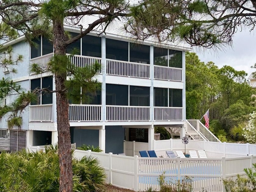 With over 3000 square feet under roof, including two large - Beach Home for sale in St. George Island, Florida on Beachhouse.com
