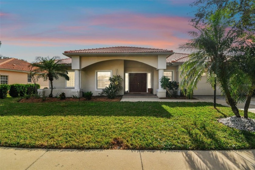 Enjoy stunning lake views from nearly every window of this light - Beach Home for sale in Sarasota, Florida on Beachhouse.com