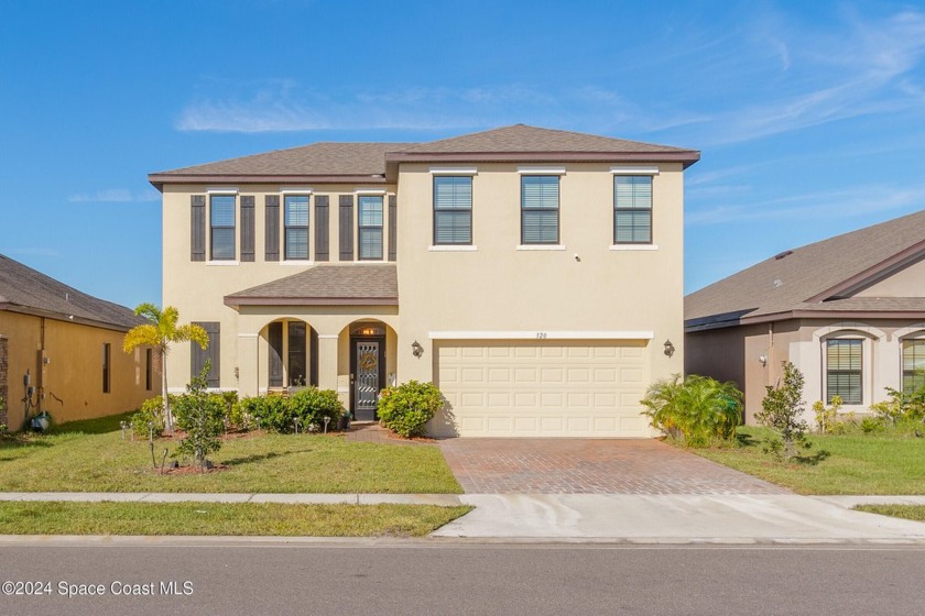 Nestled in a gated community of the beautiful Sawgrass Lakes in - Beach Home for sale in West Melbourne, Florida on Beachhouse.com