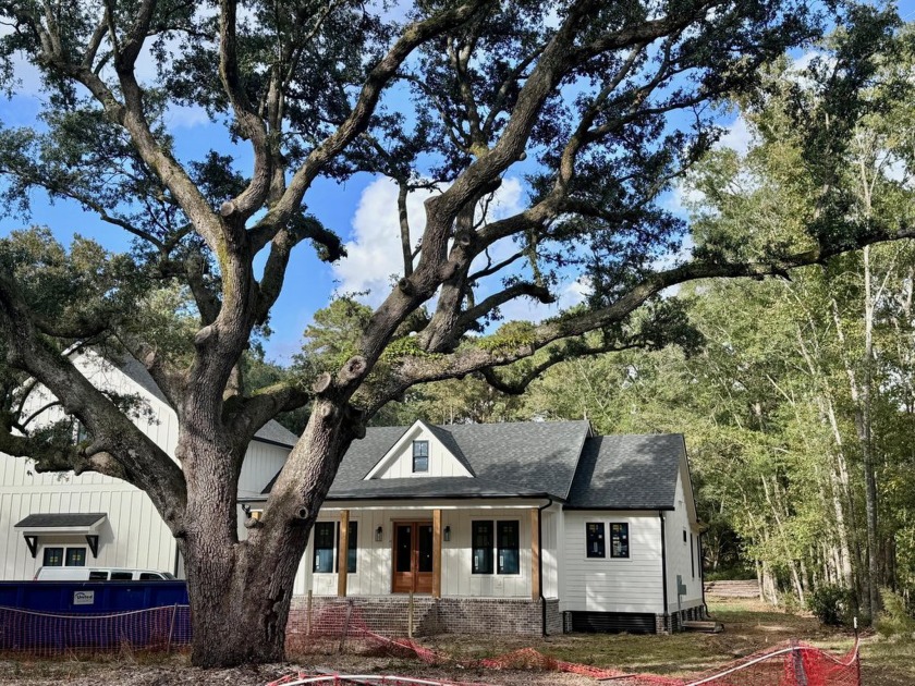 Discover a rare gem on nearly an acre of pristine land graced by - Beach Home for sale in Johns Island, South Carolina on Beachhouse.com