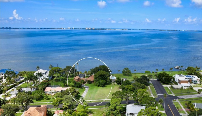 Set on nearly an acre of lush bayfront property, this - Beach Home for sale in Sarasota, Florida on Beachhouse.com