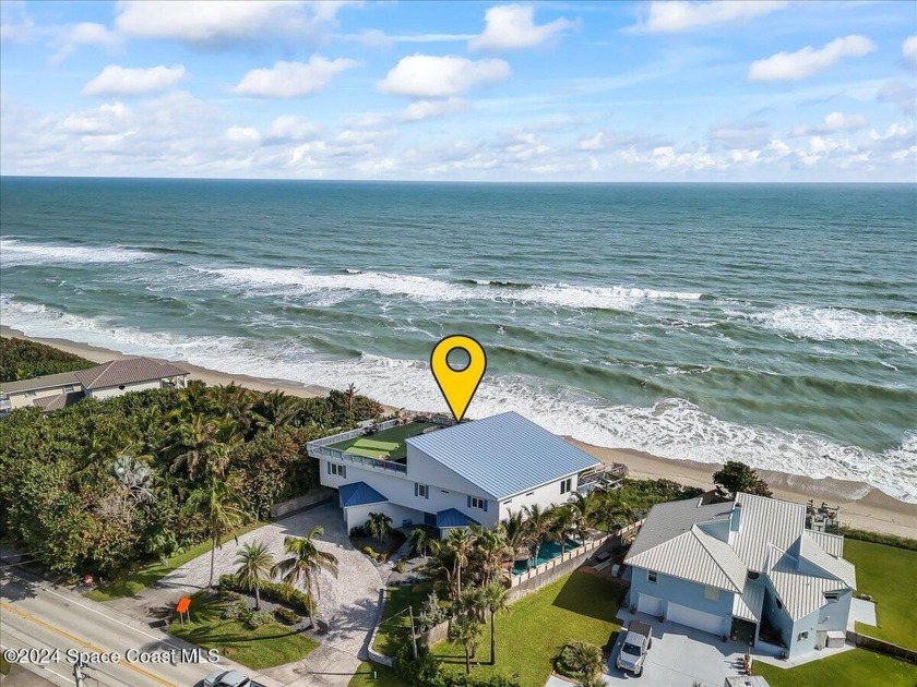 Welcome to your dream oceanfront retreat on the stunning Space - Beach Home for sale in Melbourne Beach, Florida on Beachhouse.com