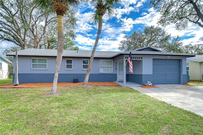 Welcome to 14723 54th Way N Clearwater, FL 33760! -NO FLOODING - Beach Home for sale in Clearwater, Florida on Beachhouse.com