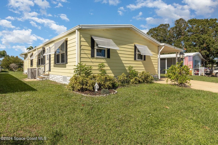 Well cared for home with lots of space ready for new owners - Beach Home for sale in Barefoot Bay, Florida on Beachhouse.com