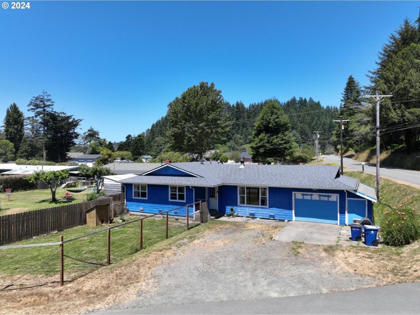 This updated single-level ranch-style home is a gem, featuring - Beach Home for sale in Gold Beach, Oregon on Beachhouse.com