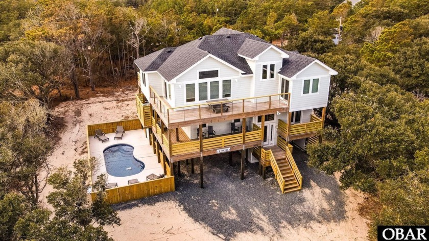 Completed in 2024, this new construction home nestled in the - Beach Home for sale in Corolla, North Carolina on Beachhouse.com