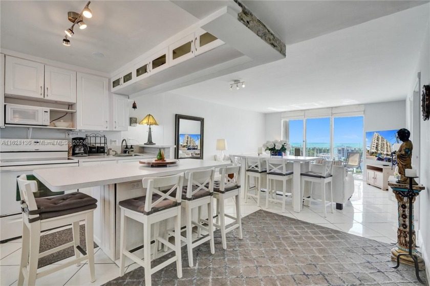 Experience coastal living with this charming 2-bedroom - Beach Condo for sale in Miami Beach, Florida on Beachhouse.com