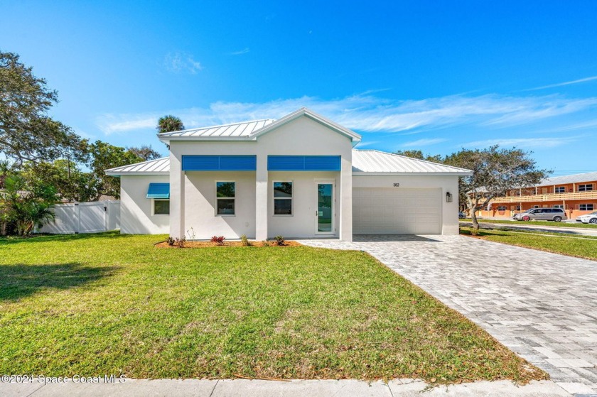 NEW CONSTRUCTION!! Brand new single family home that offers 3 - Beach Home for sale in Cocoa Beach, Florida on Beachhouse.com