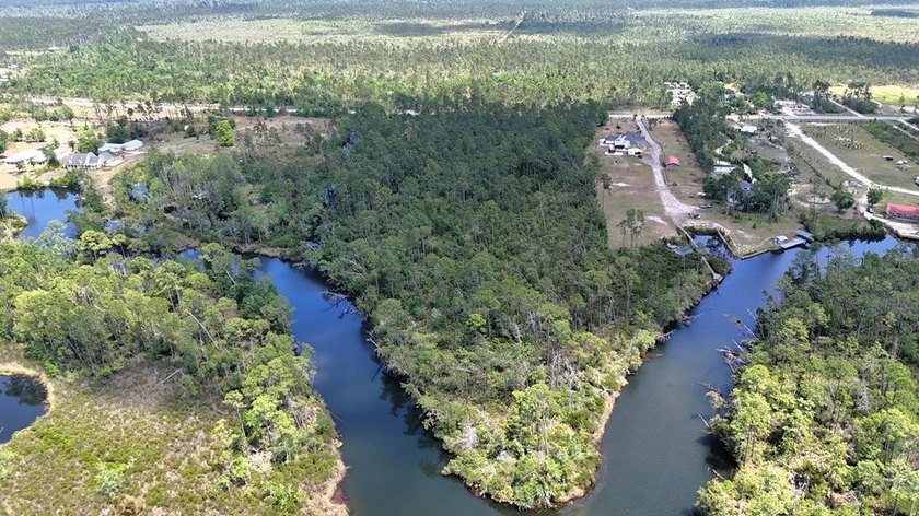 Discover 10.72 acres of waterfront land along scenic Wetappo - Beach Acreage for sale in Wewahitchka, Florida on Beachhouse.com